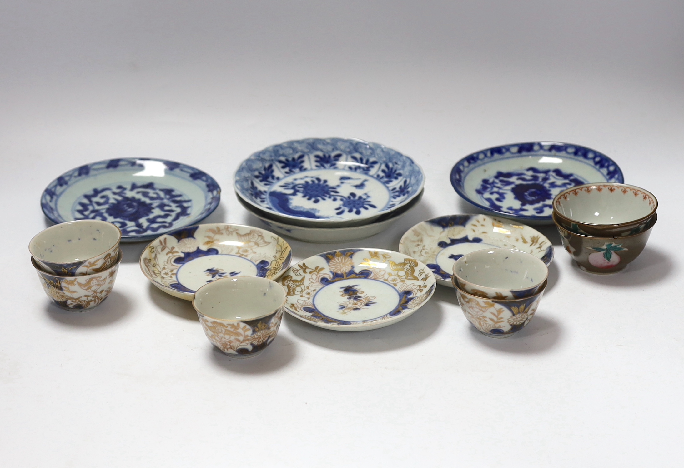 Four 18th century Japanese teabowls with three matching saucers, two 19th century Chinese cafe au lait glazed teabowls and four Chinese blue and white small dishes